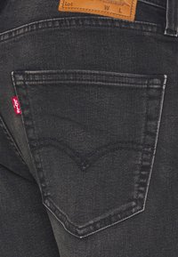 Levi's® 512® SLIM TAPER - Calças de ganga justas - snow fort warm