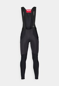 Cuissards de cyclisme noirs avec bretelles ajustables, panneaux en mesh et rembourrage au niveau du siège ; combine différentes textures de tissu pour le confort et l'ajustement.
