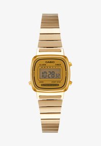 Atlasīts, gold-coloured