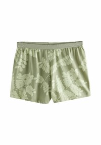 Grønne shorts lavet af blødt stof, med et mønster af blade i en lysere grøns skygge og en elastisk talje.