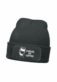 Black beanie hat with a ribbed texture. Features a rectangular patch with the text "FUELED BY COFFEE" and an illustration of a coffee cup.