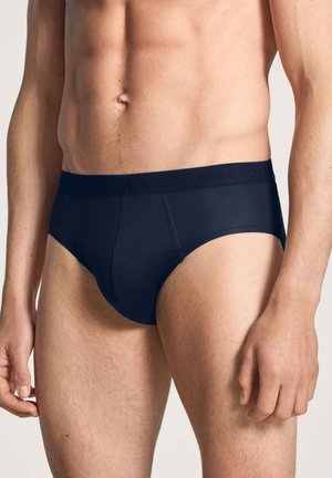Navyblauwe herenbriefs met een aangesloten ontwerp, voorzien van een zachte tailleband met de opdruk "CALIDA." Gemaakt van gladde, rekbare stof.
