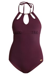 Maillot de bain une pièce bordeaux avec une découpe en forme de clé, un col noué et des accents dorés. Fait en tissu doux avec un détail taille froncée.