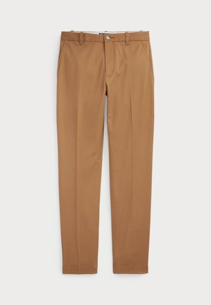 Smeđi pamučni hlače slim-fit kroja, ravnog prednjeg dijela i standardnih džepova; glatka tekstura i obrubljene manžete.