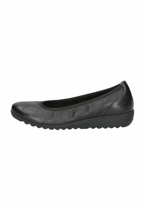Black flat shoe made of textured leather. Rounded toe with a cushioned black interior. Flexible rubber sole with a ribbed pattern.