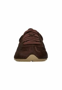 Brown athletic shoe with textured upper, lace-up design, contrasting stitching, and a rubber outsole. Smooth toe and rounded shape.