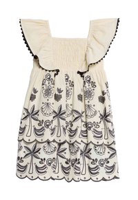 Cream dress with black embroidery featuring floral and tropical patterns. Puffed ruffled sleeves with subtle scalloped hem. Textured fabric.