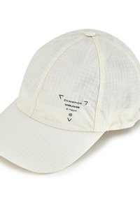 Adjustable cream cap made of lightweight grid-patterned fabric. Features a logo on front and round top button. Curved brim design.