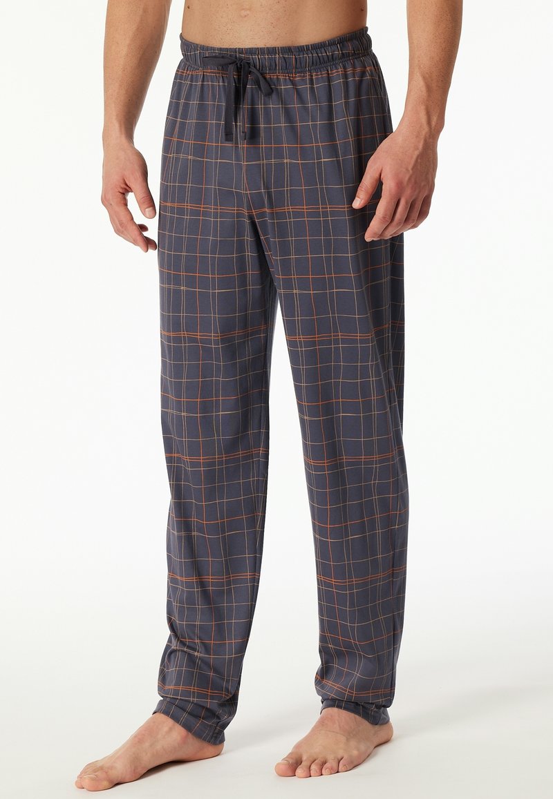 Men's navy plaid pajama pants, with orange grid lines. Features an elastic waistband and drawstring, made of soft fabric.