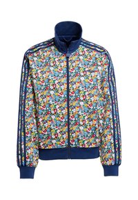 Blommig jacka med dragkedja i blått, med ett färgglatt blommönster, hög krage och kontrasterande randiga mudd och sidor. Mjuk textur.