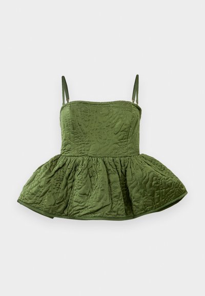 Sleeveless green quilted crop top with a flared peplum hem, featuring intricate surface patterns and thin adjustable straps.