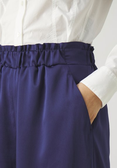 Claudie Pierlot Tygbyxor - indigo
