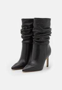 Guess Stivaletti con tacco - black