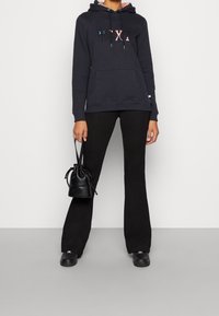 Roxy Jersey con capucha - black