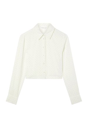 Blusa cropped a maniche lunghe color crema con colletto alla francese, decorata con piccole pois dorate, realizzata in un tessuto morbido.