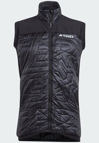Schwarze Weste mit hohem Kragen, ausgestattet mit einer steppartigen Textur und diagonalen Mustern. Reißverschluss und reflektierendes Logo auf der Brust.