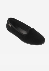 Ball flat in velluto nero con texture liscia, punta tonda e bordino elastico. Presenta una suola in gomma nera e una piccola etichetta del marchio.