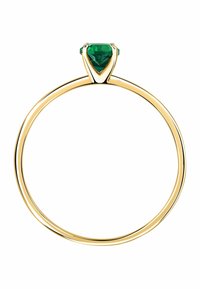 Guldring med en triangular grön ädelsten, med ett tunt, slätt band och en minimalistisk design. Ädelstenen är inställd i en V-formad klor.