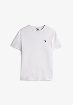 T-shirt en coton blanc avec un col rond, des manches courtes, arborant un petit logo rouge, blanc et bleu sur le côté supérieur gauche.