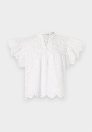 White blouse featuring a round neckline, flutter sleeves, embroidered eyelet details, and a scalloped hem. Made from lightweight fabric.