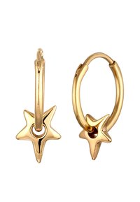 Boucles d'oreilles en or avec un pendentif en forme d'étoile, texture lisse et finition polie. L'étoile a cinq branches et un trou central.