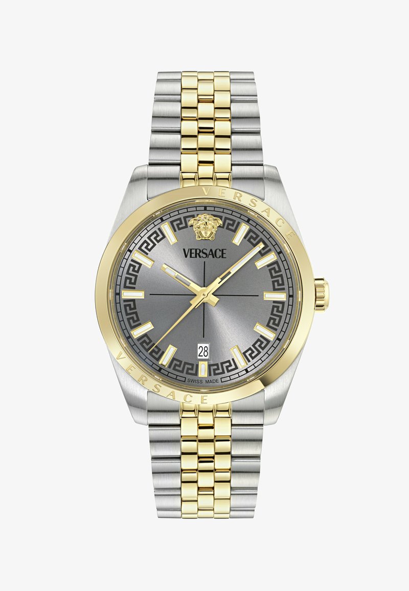 Montre-bracelet Versace en argent et or avec cadran gris, index dorés, affichage de la date à 6 heures et logo Méduse à 12 heures.