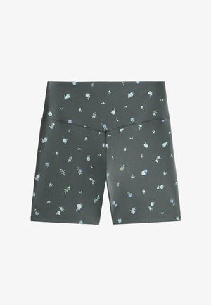 Shorts taille haute gris foncé avec des petites impressions florales blanches et bleues dispersées et une couture en forme de V au centre devant.