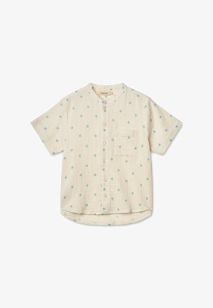 Lyhythihainen, napillinen paita vaaleassa kermansävyssä, jossa on turkoosi kukkakuosi. Sisältää taskun, kaarevan helman ja tekstuuripinnoitteen.