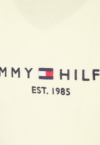 Tommy Hilfiger TOMMY LOGO TEE - T-shirt estampada - lemon twist