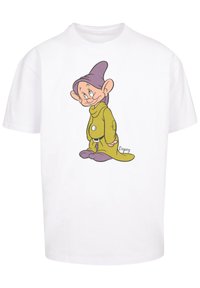 Hvit bomulls-T-skjorte med en tegneserieillustrasjon av en karakter med en lilla hatt og grønne klær, smilende, med tydelige ører og ansiktstrekk.