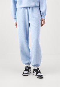 Jordan PANT - Pantalones deportivos - blue