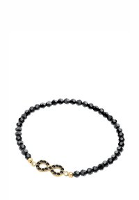 Schwarzes Perlenarmband mit facettierten Perlen und einem goldenen Unendlichkeitssymbol, das in der Mitte mit schwarzen Edelsteinen verziert ist.