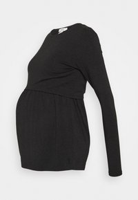 Svart långärmad gravidtröja med rund halsringning och rynkad söm under bysten, tillverkad av mjukt material, utformad för komfort under graviditeten.