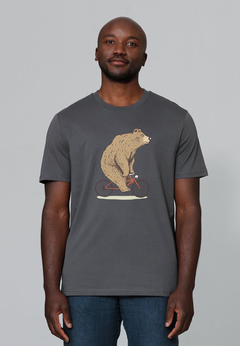Grijze katoenen t-shirt met een beer die op een rode fiets rijdt. Korte mouwen, ronde hals en een gladde textuur met gedrukt grafisch detail.
