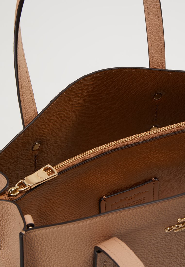 Coach CHARLIE CARRYALL Håndveske beechwood Zalando.no Coach CHARLIE CARRYALL Håndveske sand taupe Zalando.no