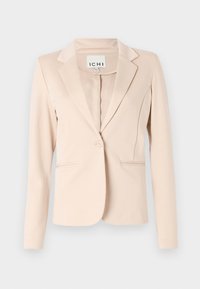 Blazer beige da donna realizzato in tessuto liscio, con chiusura a singolo bottone, rever con intagli e due tasche frontali.