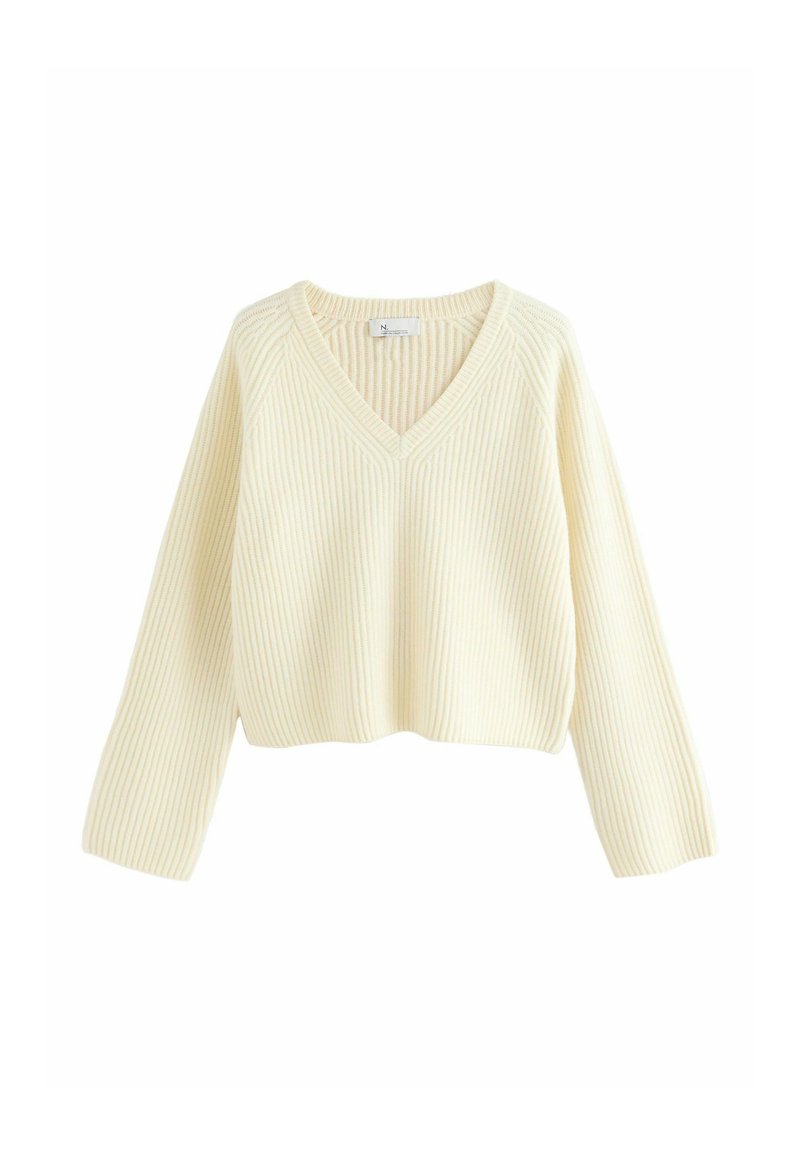 Cremefarvet, cropped sweater med ribbet tekstur, V-hals og lange ærmer. Har en afslappet pasform og et enkelt design.