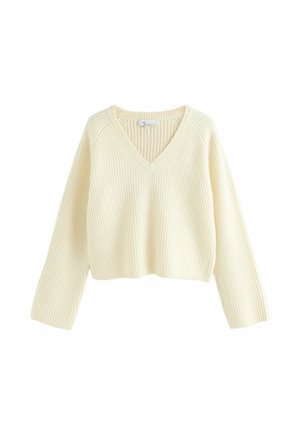 Kreemikreem värvi lühikeste varrukatega kampsun ribateraga tekstuuriga, V-kaelusega ja pikkade varrukatega. Omab vabalt langetatud lõiget ja lihtsat disaini.