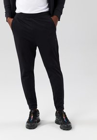 Pier One Sport - Pantalon de survêtement - black Image miniature 1