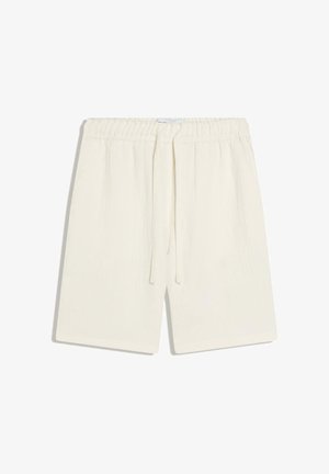 Cream-colored elastic waist shorts with drawstring and side pockets, made from lightweight fabric.