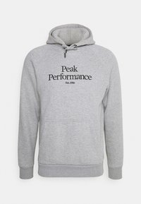 Sweat à capuche gris clair avec poche avant et texte noir "Peak Performance Est. 1986" centré sur la poitrine, capuche à cordon de serrage et poignets côtelés.