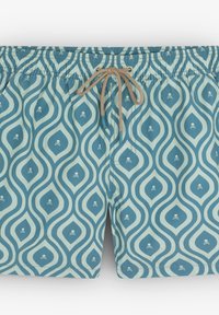 Shorts de bain bleus à motif avec un design de vagues et de petits icônes de tête de mort. Taille élastique avec un cordon de serrage pour un ajustement réglable.