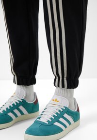 adidas Originals ADICOLOR 70S - Joggebukse - black