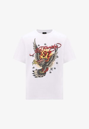 White cotton T-shirt featuring a large, colorful eagle graphic with wings, the text "Ed Hardy 97," and star accents in black and red.