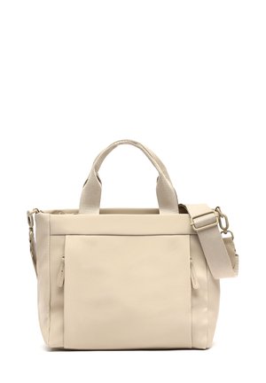 Beige tote bag made of soft material, featuring dual top handles, a detachable strap, and a front zip pocket. Minimalistic design.