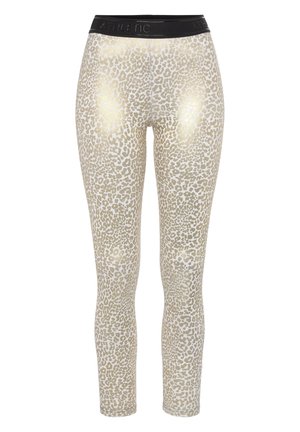 Leggings in a light beige color with a leopard print pattern, featuring a shiny gold finish. Black elastic waistband with "ATHLETIC" branding.