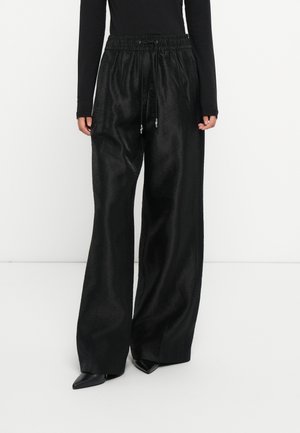 HAWILA - Housut - black