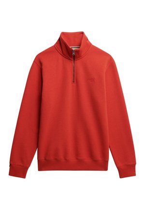 Czerwona bluza z suwakiem na szyi, wykonana z miękkiego materiału. Posiada długie rękawy, ściągacze przy mankietach oraz subtelne logo na piersi.
