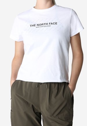 Biała bawełniana koszulka z krótkim rękawem z czarnym napisem "THE NORTH FACE" oraz "NEVER STOP EXPLORING" na przodzie.