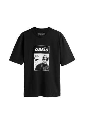 Svart bomulls t-shirt med ett grafiskt tryck av två figurer i monokromt med texten "oasis" ovanför i en fet rektangulär ram.
